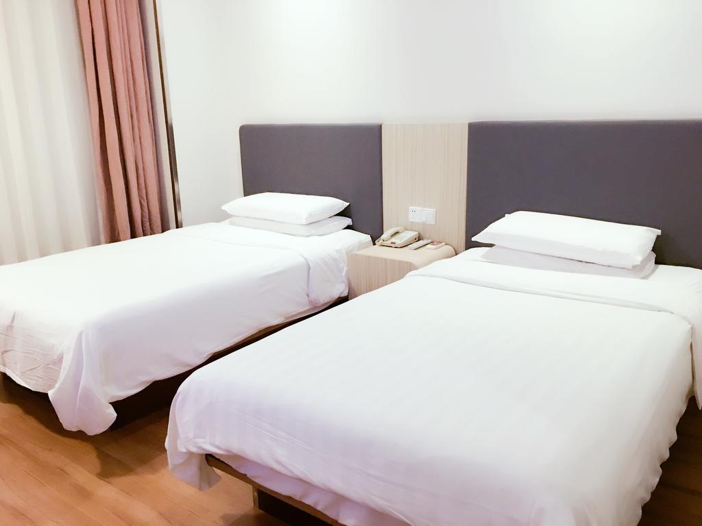 ฮั่นถิง โฮเทล เซี่ยงไฮ้ สถานีรถไฟใต้ดินสนามฟุตบอลหงโขว Hotel ภายนอก รูปภาพ